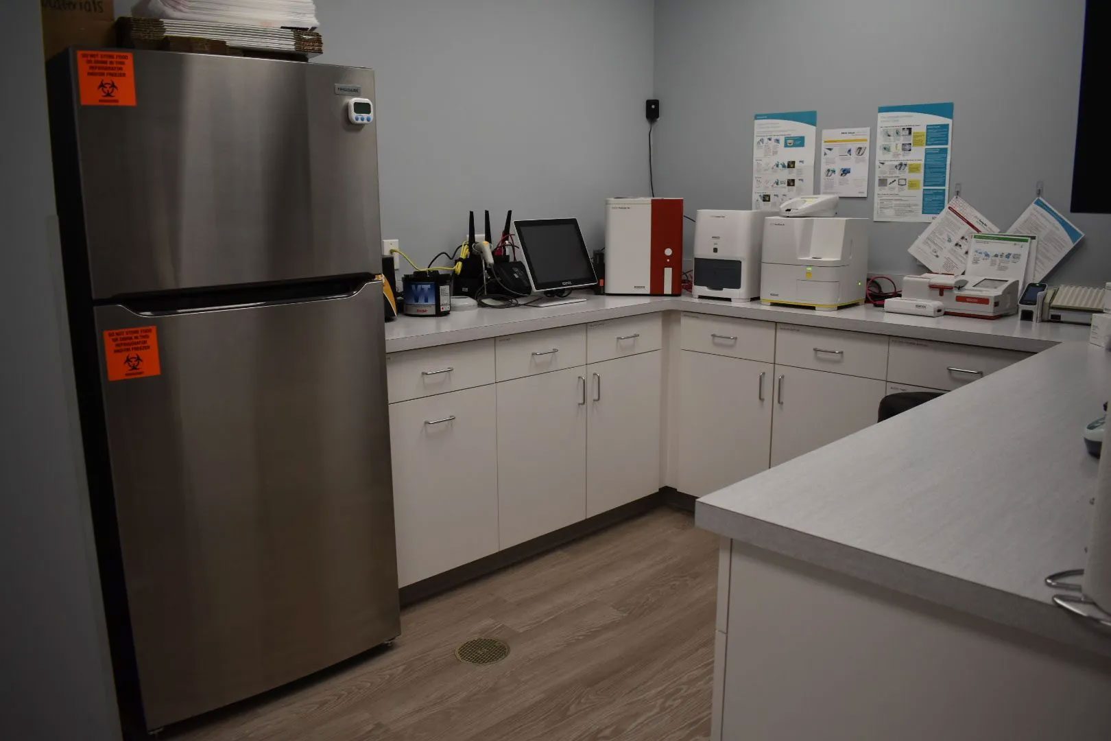 in-house laboratory at Hershey Animal Emergency Center with refrigerator and lab equipment